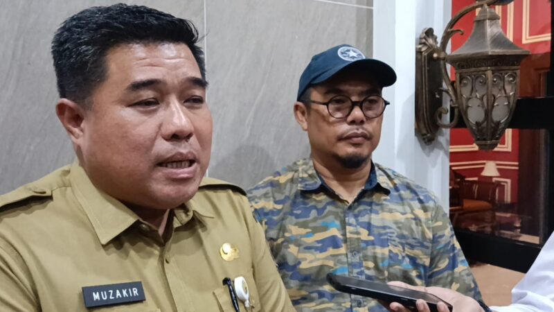 Karo Umum Muzakir dan Plt. Karo Hukum Ali Zaini usai melapor ke Polda Jambi.